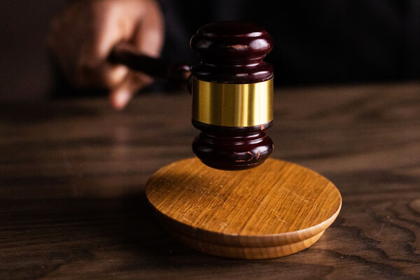 Closup of a striking gavel.