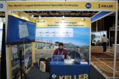 A branded booth with company representatives.