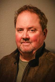 headshot of erik james