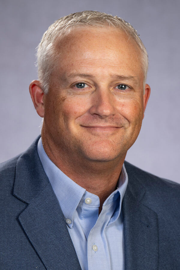 headshot of Simonton