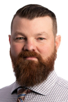 headshot of john mckinnon